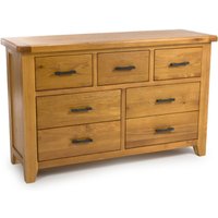 Hewitt Wide Wooden Chest Of 7 Drawers In Rustic Oak